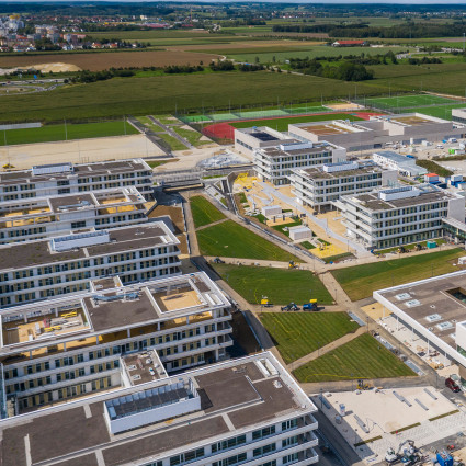 The education campus and sports park were built before the residential development.