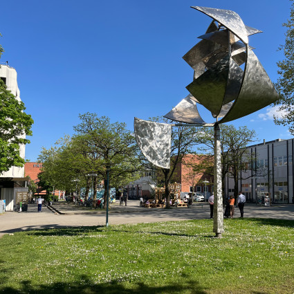 The artwork can currently be found behind the Shopping Centre pep at the eastern end of the residential ring road.