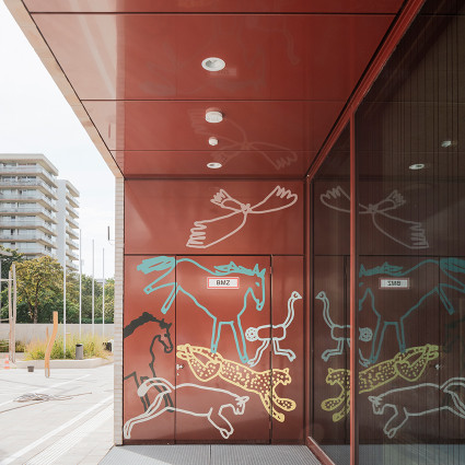 Animal line drawings welcome children and pupils at the entrance areas.