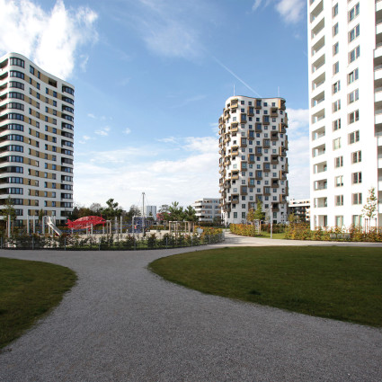 The high-rise buildings are connected by a footpath system.