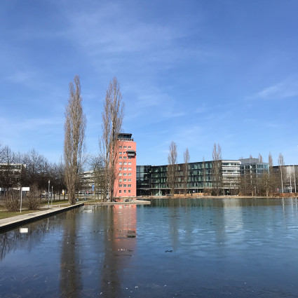 View over the 'Messesee' (lake) from the south towards the Brainlab Tower, 2021
